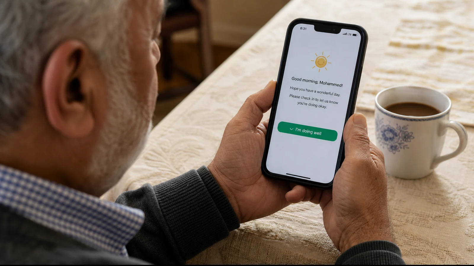 A phone showing a friendly good-morning text with a single check-in button