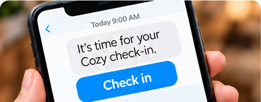 A phone showing the text: It's time for your Cozy check-in, with a Check in button.